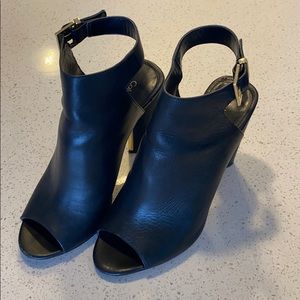 Black high heel open toe and heal booties